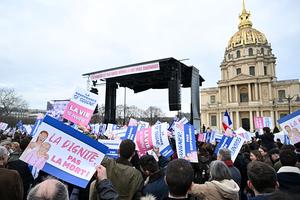 A demonstrator holds a placard reading “Dignity not death!” during the “Marche pour la Vie” (“March for Life”) to protest against France’s bill for the creation of a right to assisted dying, at the Place Vauban in Paris on Jan. 18, 2026. A major societal reform of the French president’s second five-year term, a bill on assisted dying has been debated multiple times and the National Assembly gave final approval on July 15, making France one of the few European countries to legalize the practice. 