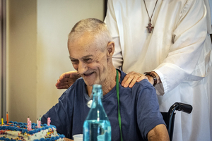 A Gospel of Life Disciples + Dwellings (GOLD) resident celebrates his birthday at the St. John Paul II Dwelling in Moore, Oklahoma. 