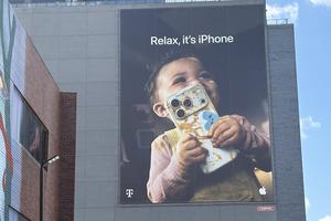 A new Apple ad takes up the facade of a building at a major intersection in Washington, D.C.