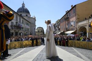 Pope Leo XIV waves to the faithful gathered at the Piazza della Libertà at Castel Gandolfo for his Sunday Angelus on Aug. 16, 2026. 