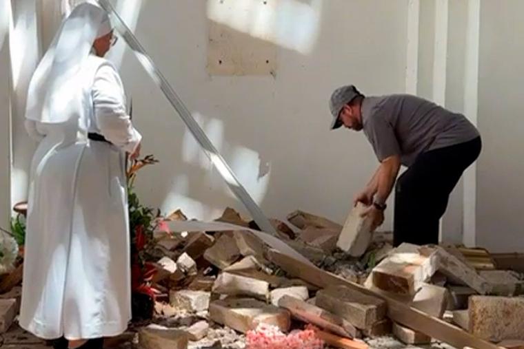 Priest and Nun Recover Sacred Hosts From Earthquake Rubble in Colombia
