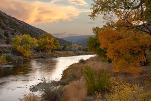 The Rio Grande River flows through Embudo, Rio Arriba County, New Mexico, near Santa Fe in an undated photograph.