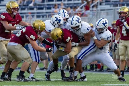 How a Catholic High-School Football Rivalry in Indiana Is Helping to Tackle Hunger